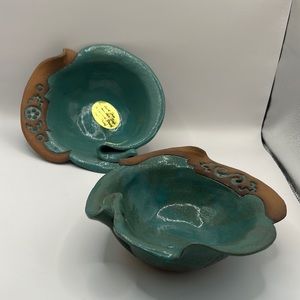 Two small serving bowls, artistically made with stone pottery.